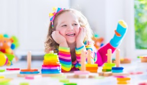 girl-playing-with-toys