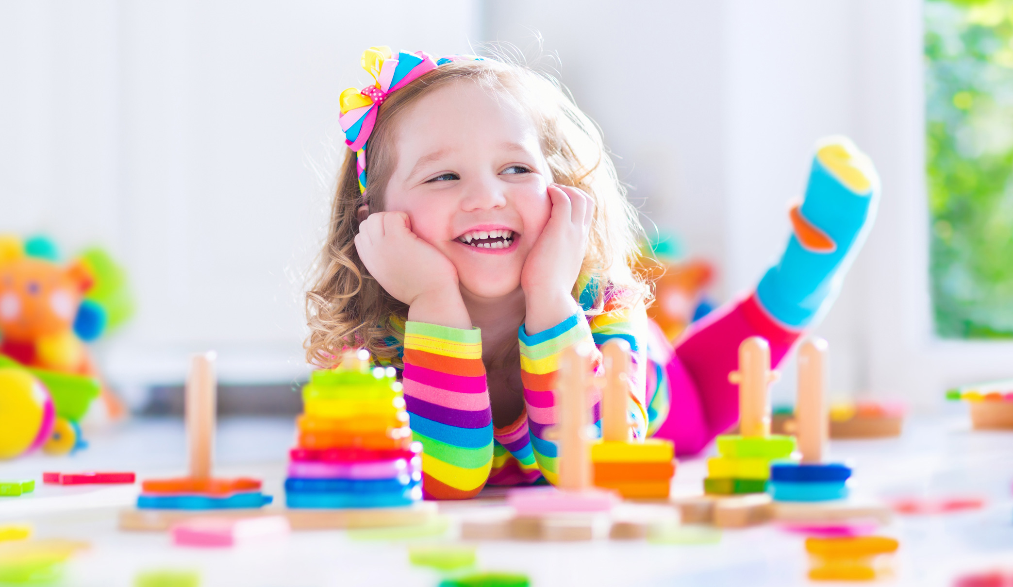 girl-playing-with-toys